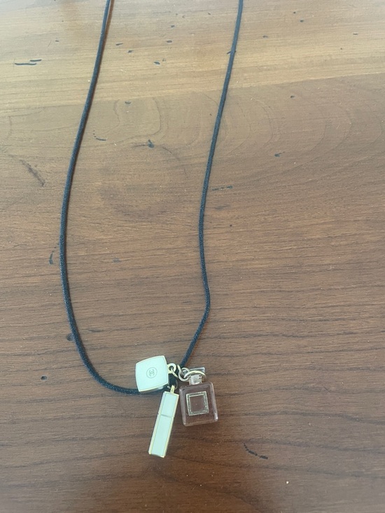 CHANEL Accessories - Chanel Coco Mademoiselle Gold Charm Necklace on Adjustable Black Cord
